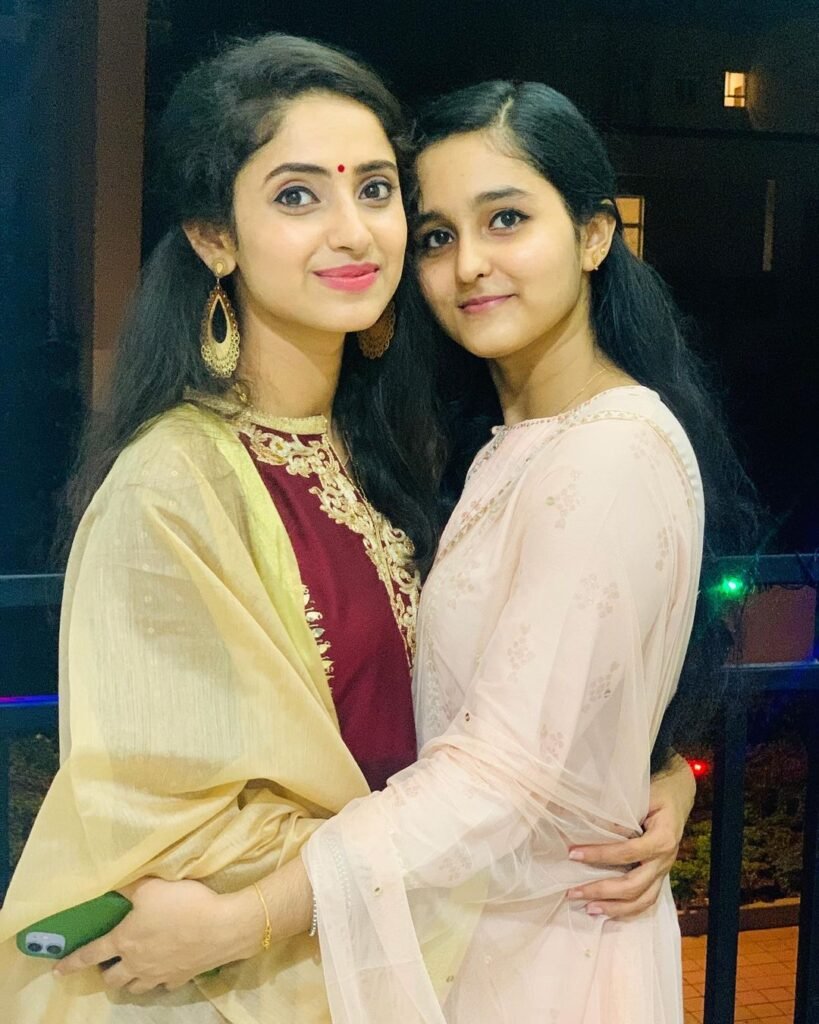 Ayesha with her sister